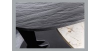 Zoom sur le plateau noir de la table basse ORBIS avec plateau texturé et aspect marbre