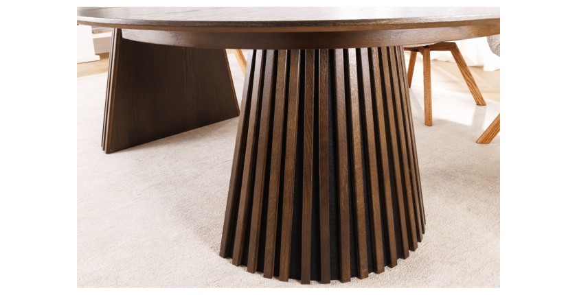 Zoom sur l'un des pieds de la table extensible KANOVA 120-160-200cm en bois foncé
