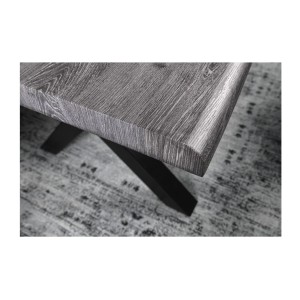 Zoom sur le coin de la table RIVET 160cm aspect bois gris