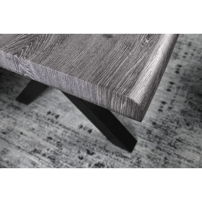 Zoom sur le coin de la table RIVET 180cm aspect bois gris