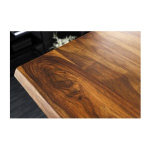 Zoom sur le coin du plateau du bureau ARKAYA 140cm en sheesham réglable en hauteur
