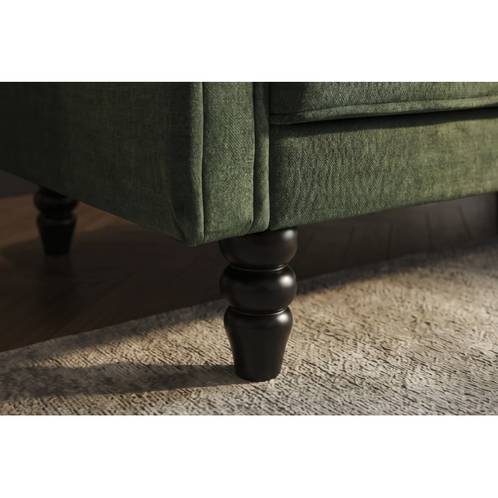 Zoom sur les pieds du canapé convertible MILES vert