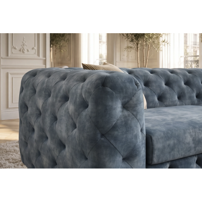 Zoom sur l'accoudoir du canapé VELENA bleu