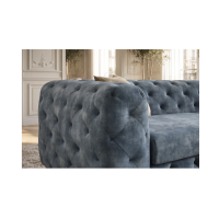 Zoom sur l'accoudoir du canapé VELENA bleu