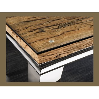 Zoom sur le coin de la table VELENA avec plateau bois et pieds argentés