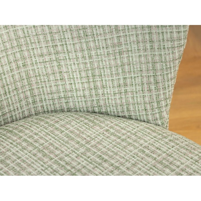 Zoom sur la jonction entre le dossier et l'assise de la chaise PAVIA verte à carreaux