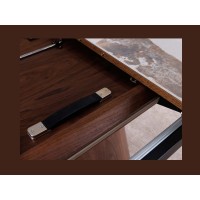 Zoom sur le système d'extension du plateau de la table extensible LUMEA avec plateau en céramique et pied en bois de noyer