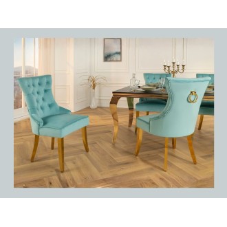 Chaise REGINA bleu turquoise et doré mise en situation