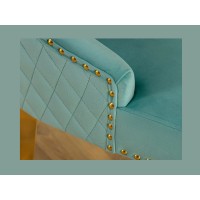Zoom sur l'accoudoir de la chaise REGINA bleu turquoise et dorée avec tête de lion