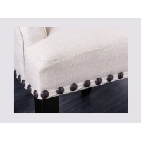 Zoom sur les détails de l'assise du fauteuil REGINA beige et marron foncé