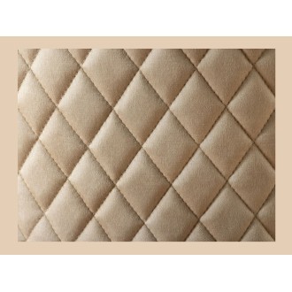 Zoom sur le matelassage de la chaise REGINA beige et dorée