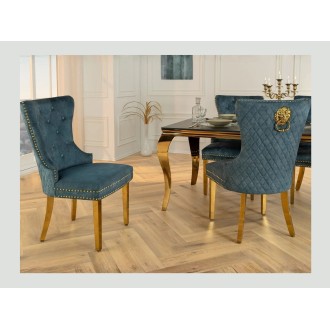 Chaise REGINA bleue pétrole et dorée vue légèrement de côté