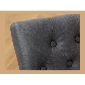 Zoom sur le dossier de la chaise REGINA noire en cuir