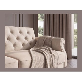 Zoom sur le côté du canapé MILES 3 places beige champagne convertible